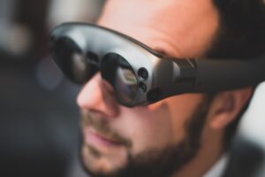 man wearing google AR/VR glasses